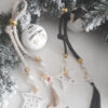Γούρι Χριστουγεννιάτικο με μπέζ κορδόνι κρύσταλλα,πέρλες,ξύλινο αστέρι και έλατο με φούντα μπεζ,επιχρυσωμένο 18 τριφύλλι και πετραδάκι κοράλι για τύχη